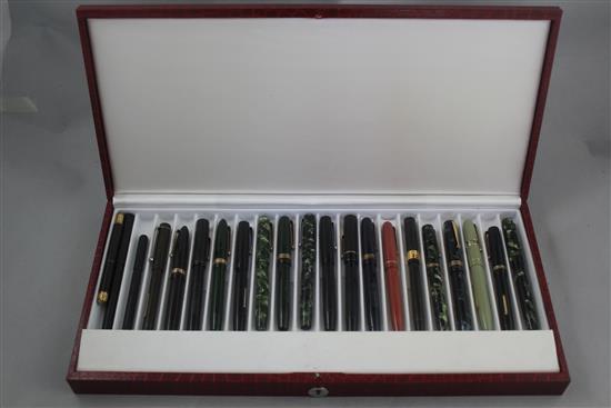 A collection of twenty Mabie Todd Swan fountain pens and a similar ejector pencil,